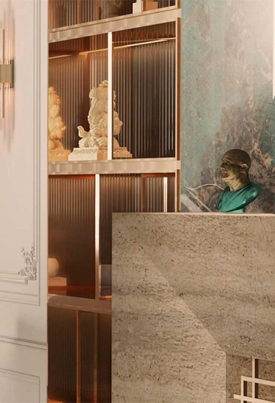 A bronze bust with a blue patina is placed on the edge of a mantelpiece. There is a very elegant setting with a display case of artwork in the background. The bronze bust appears to be the inspiration of the pianist