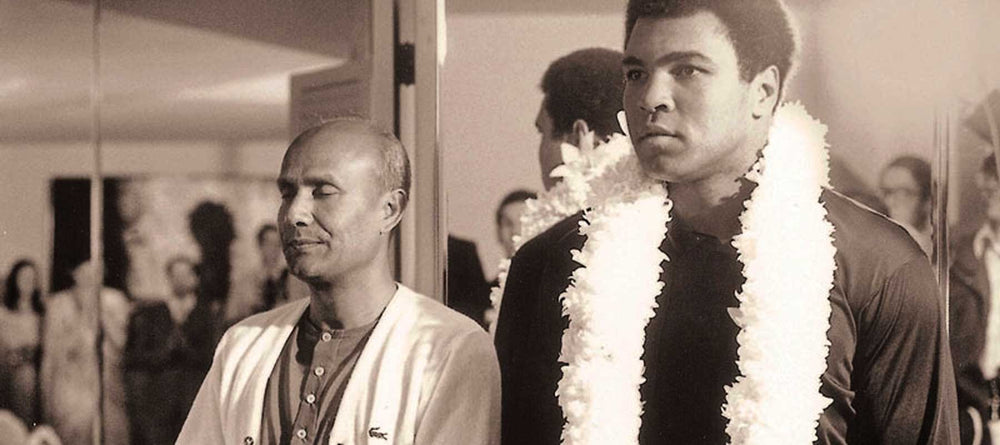 Sri Chinmoy with Muhammad Ali in picture.