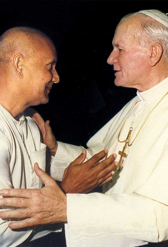 Sri Chinmoy with Pope John Paul II. in the picture.
